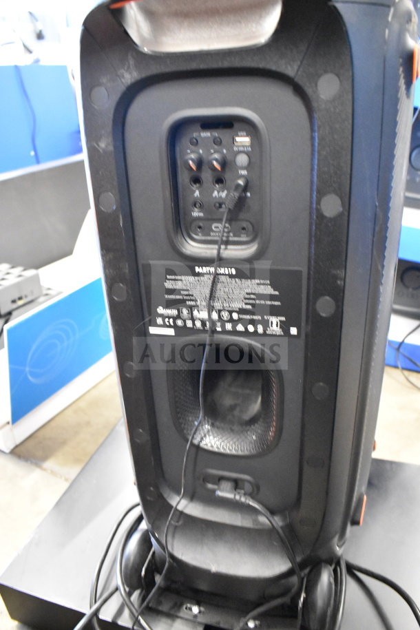 JBL Partybox 310 speaker, store display model, showing back panel with connections and labels, in good condition.