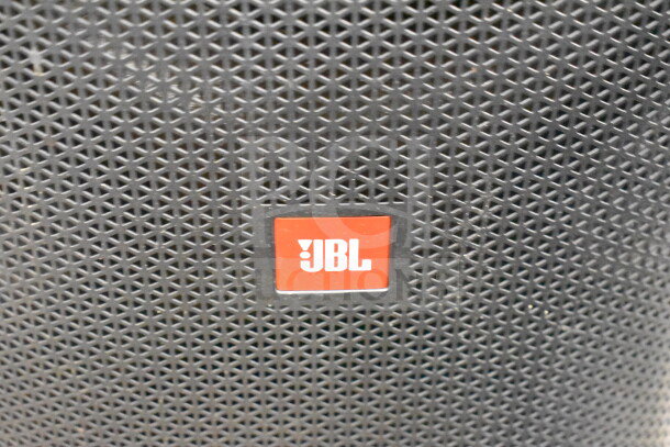 JBL speaker with black mesh grille and red logo, indicating quality sound. Includes 2 items, doubling bid value.