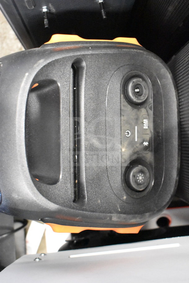 JBL speaker in good condition featuring bass boost and Bluetooth connectivity. Dust present. Includes additional item.