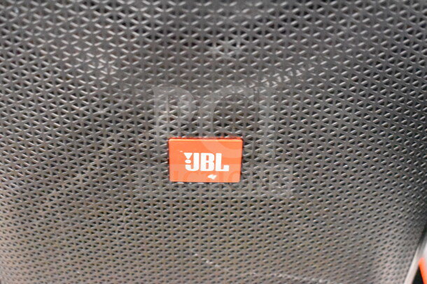 2 JBL Partybox 310 speakers with logo, featuring a black grille. Doubles your bid. Ideal for events or personal use.