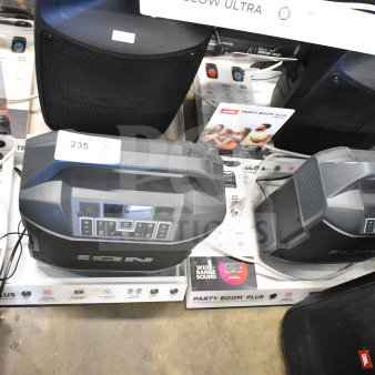 Ion Party Boom Plus Speakers on store display, featuring versatile connectivity, wide-range sound, and Bluetooth capabilities.