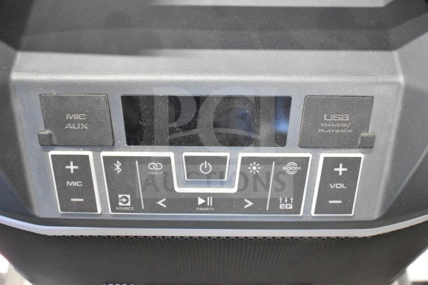 Ion Party Boom Plus Speaker control panel with mic, USB, and volume buttons. Features Bluetooth, EQ, and power controls.