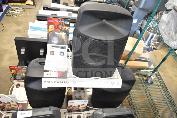 3 Ion Pro Glow Ultra speakers on display, excellent condition. Features Bluetooth connectivity, vivid sound, and dynamic lighting.