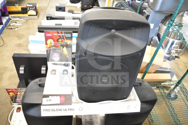 Ion Pro Glow Ultra Speaker on display, black, good condition, includes promotional materials.