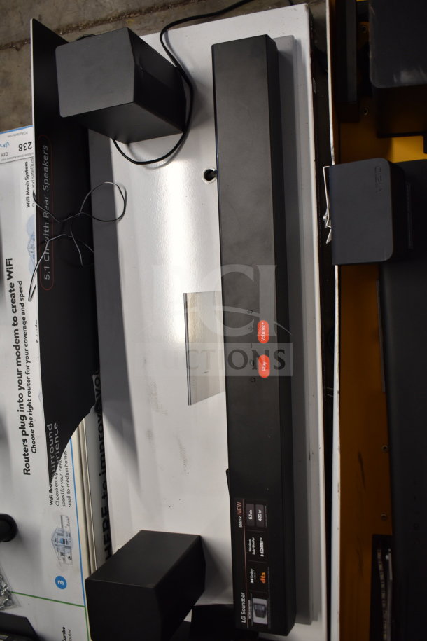 Vizio/LG soundbar display with rear speakers. Includes labels for 5.1 channel, HDMI, 420 W. Appears new.