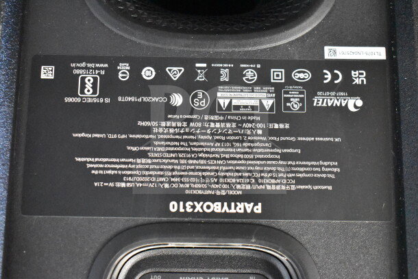 JBL Partybox 310 speaker label displaying model number, safety marks, and specifications.