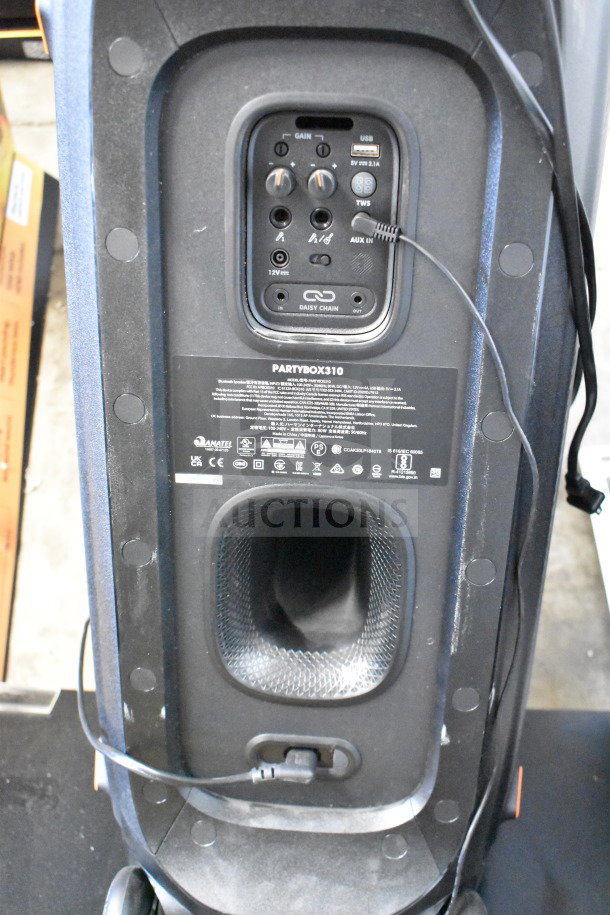 JBL Partybox 310 speaker back panel showing input controls and ports. Store display condition.