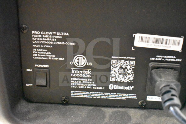 Back view of Ion Pro Glow Ultra speaker, showing labels with model information, power switch, Bluetooth logo, and barcode.