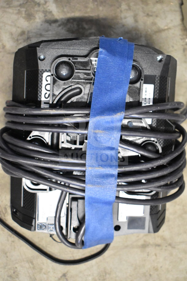 Lot of assorted corded office telephones, keyboard, and credit card reader bundled, condition unknown, with visible cords.