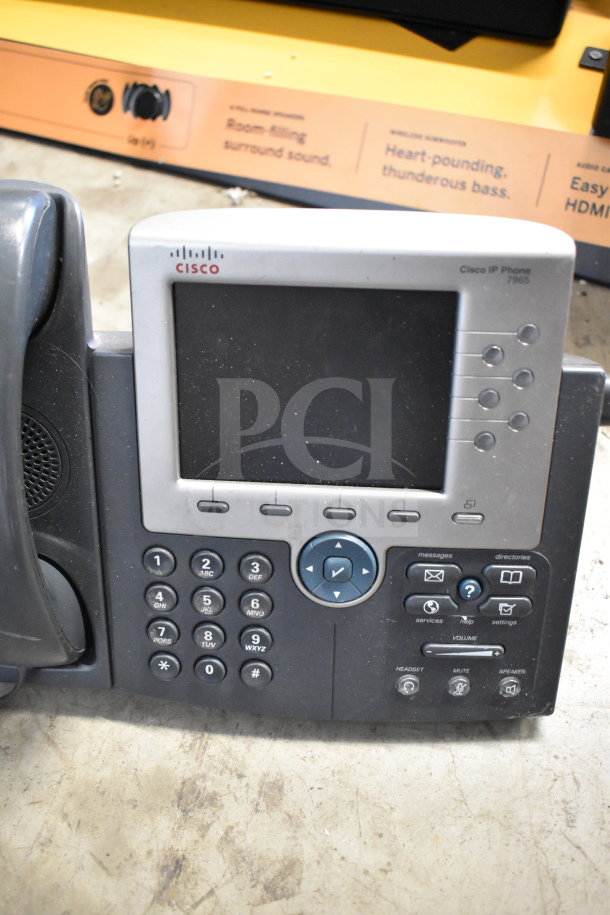 Lot of various corded office telephones, including a Cisco IP Phone 7965, plus keyboard and credit card reader, used condition.