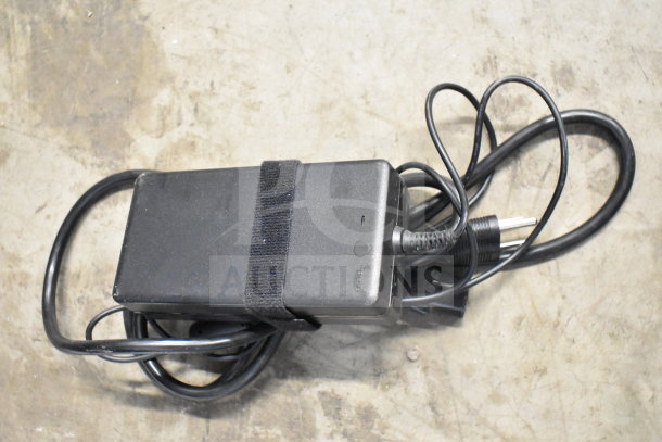 Lot of various office electronics with cords, featuring telephones, a keyboard, and a credit card reader. All items appear used.