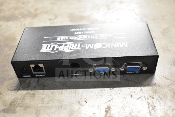 Alt text: Tripp Lite MiniCom KVM extender USB, model 0DT60001, with ports for power, system, control, and computer connections.