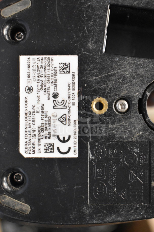 Close-up of a Zebra Technologies label on a device, model CR8178-PC, showing regulatory and certification markings.