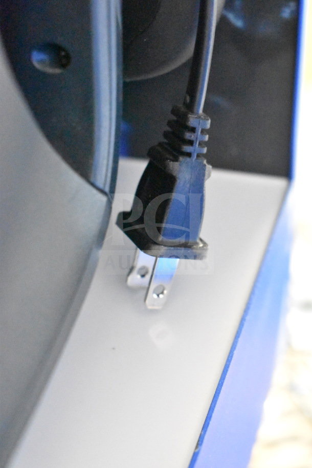Power cable of a speaker display, highlighting plug detail. Part of a set with Onn and Samsung speakers for auction.