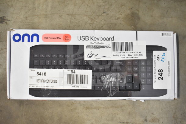 Box of ONN USB Keyboard with 104 keys, USB plug-and-play; labeled for return. Includes verification and auction tags.