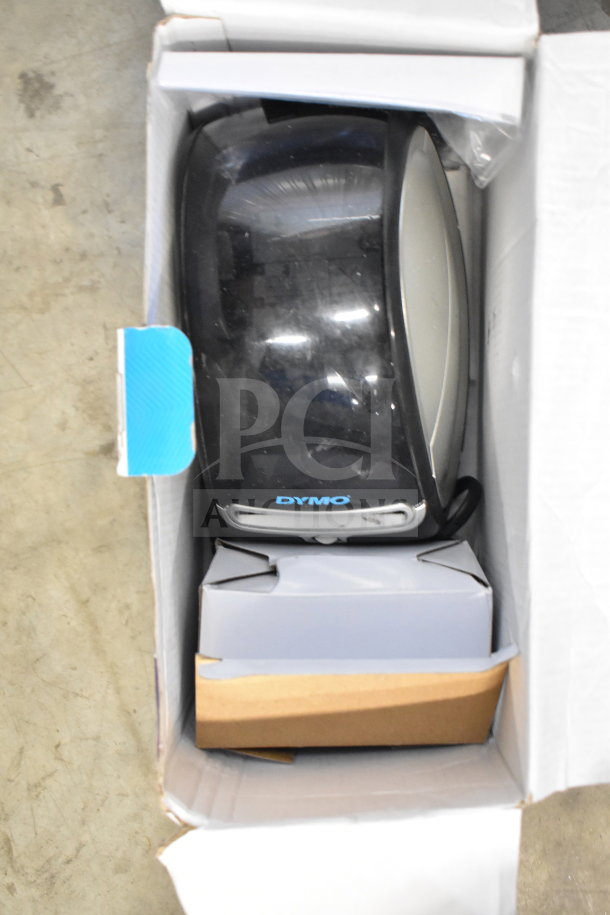 Dymo LabelWriter 450 Turbo in open box, black finish, includes packaging materials, appears in good condition.