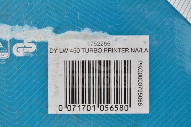 Dymo LabelWriter 450 Turbo box with barcode and text indicating model details; visible wear on packaging.
