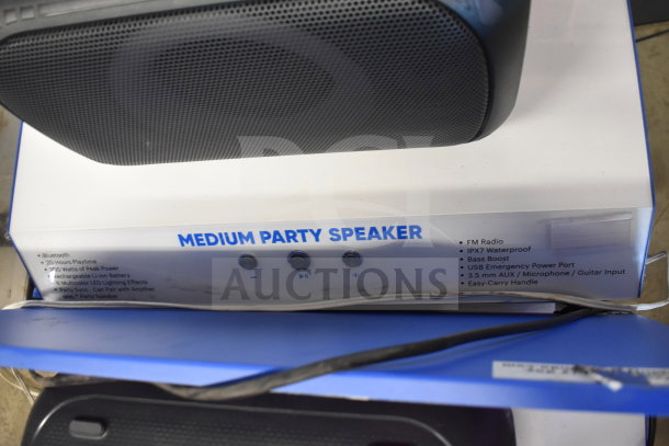 Onn Medium Party Speaker on display. Features Bluetooth, 70-hour playtime, IPX7 waterproof, FM radio, Bass Boost.