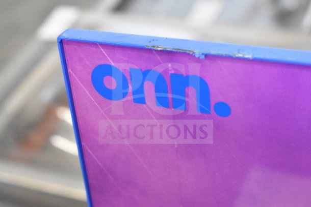 Purple store display with "onn." logo, minor wear visible. Promotes Onn Medium Party Speaker.