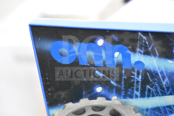 Onn. store display with decorative graphics and a visible wheel component; features Onn Large Party Speaker setup.