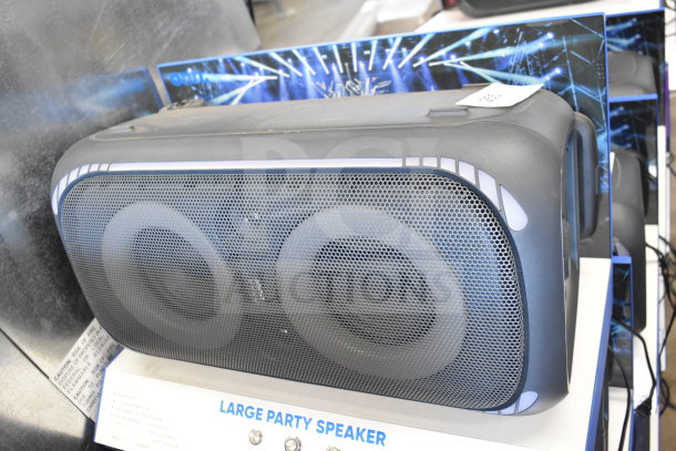 Onn Large Party Speaker display unit, featuring dual speakers, black finish, and decorative lights, in excellent condition.