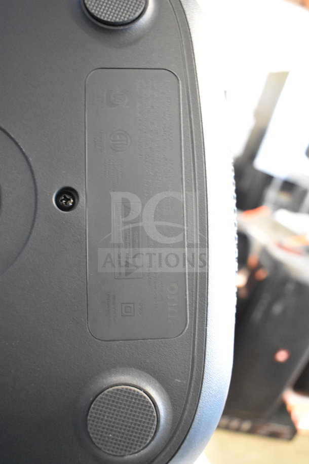 Onn Large Party Speaker bottom view showing brand label and rubber feet. Auction includes two units, enhancing value.