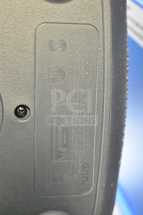 Onn large party speaker label showing model and certification markings, indicating compliance and specifications.