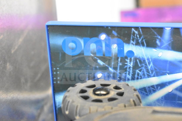 Onn store display with large party speaker. Features vibrant colors and sturdy construction. Excellent condition.