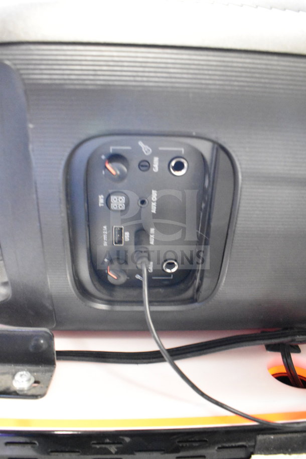 Back panel of JBL Partybox 110 showing controls and input ports, including USB and AUX connections.