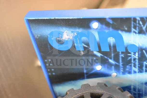 Onn store display with large party speaker, slight wear visible. Blue and black design with "Onn" logo.