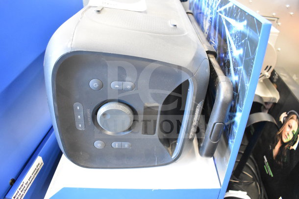 Onn Large Party Speaker store display with control panel and volume knob, in good condition with visible scuffs.