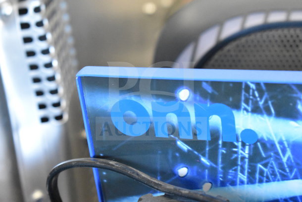 Onn store display featuring large party speaker, visible brand logo, excellent condition, perfect for events.