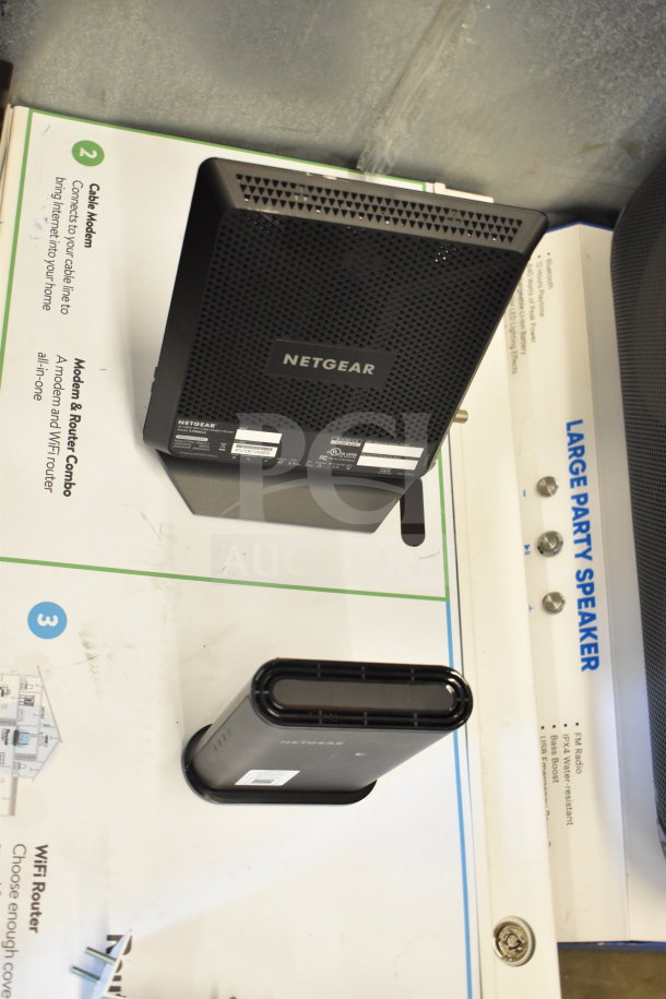 Netgear modem and router combo on display board; includes text about cable modem and WiFi functionality.