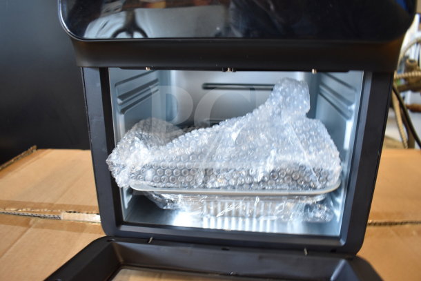 Bluebow FD-1015B Countertop Air Fryer, open door view showing interior with bubble-wrapped tray, new condition.