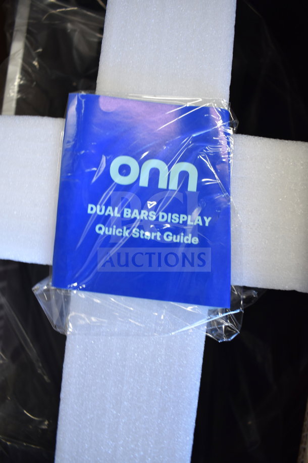 Onn Dual Bars Display in original packaging with quick start guide visible on top.