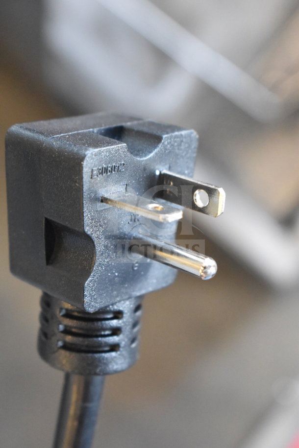 Close-up of an electric plug for a new Avantco 177F200 countertop fryer, showing 208-240V compatibility.