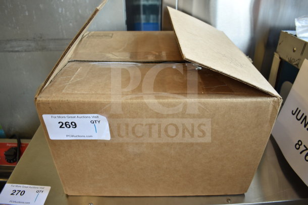 Cardboard box labeled with auction tag: Excel XL-SB 110/120 XLERATOR® Stainless Steel Cover Hand Dryer, 110/120 Volts, 1 Phase.