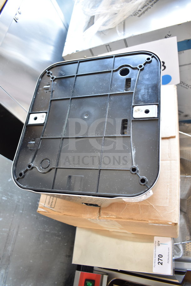 Brand new Excel XL-SB 110/120 XLERATOR® hand dryer with stainless steel cover, showing scratch and dent condition.