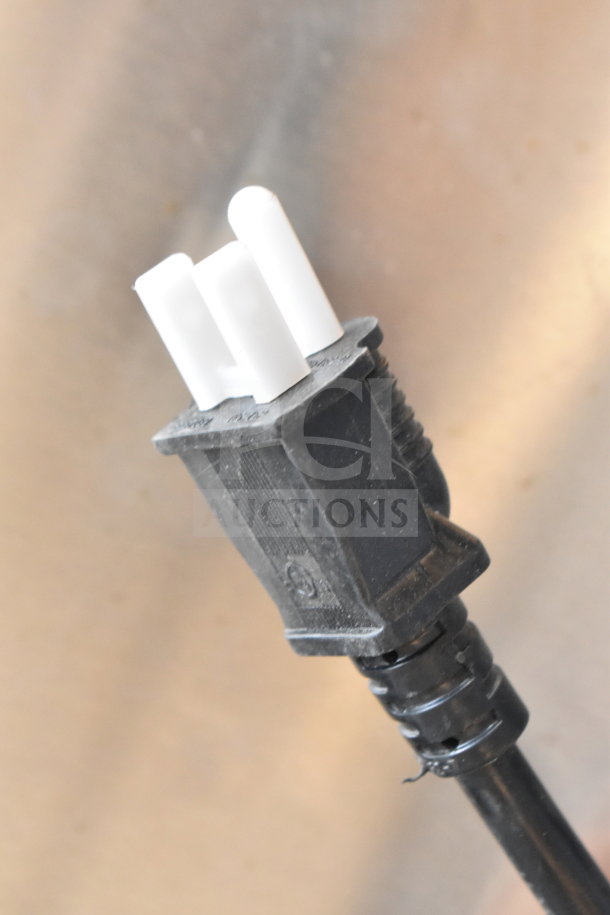 Close-up of a 3-prong electrical plug, part of the ServIt 423FFDS26 Fry Dump Holding Station, 120V, new condition.