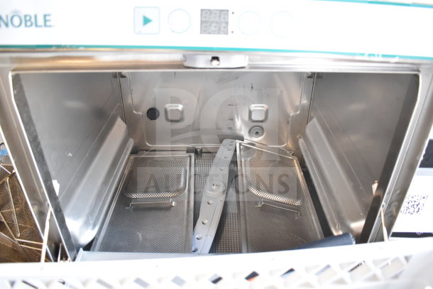 BRAND NEW Noble 495LTUC24 undercounter dishwasher, low-temp, 120V, 1 phase. Slight scratches and dents visible.