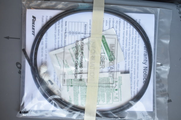 Follett 15CI114A-IW-NF-ST-00 accessory kit with warranty notice and user info, labeled packaging, new condition.