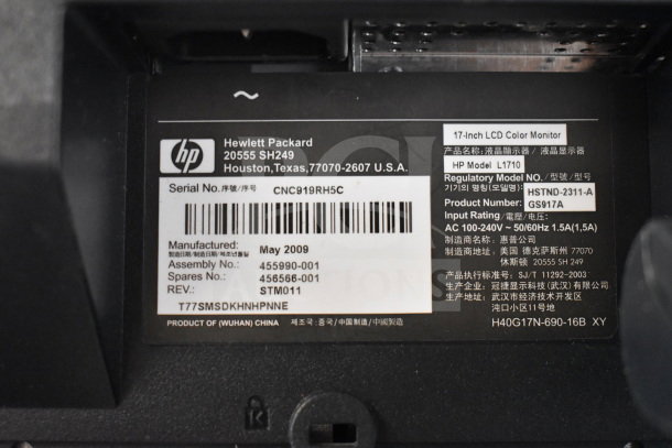 Monitor label showing HP Model L1710, manufactured May 2009, with serial number CNC919RH5C, and regulatory info.