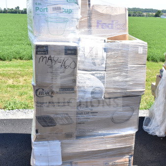 Pallet of brand new "scratch and dent" items including portion cups, towels, hand towels, plates. Labeled MAY26-160.
