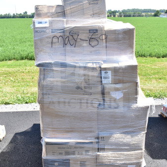 Pallet stack of brand new scratch and dent items, including pint glasses, mini fry baskets, and hand sinks. Labeled "MAY26-69."