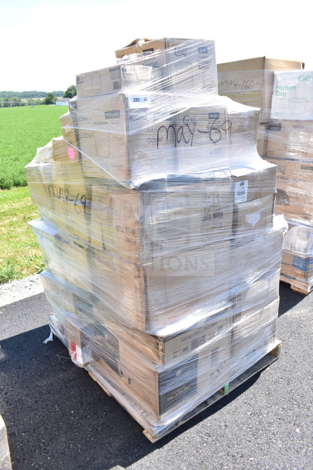 Shrink-wrapped pallet of 46 brand new scratch-and-dent items including pint glasses, mini fry baskets, and plastic tumblers.