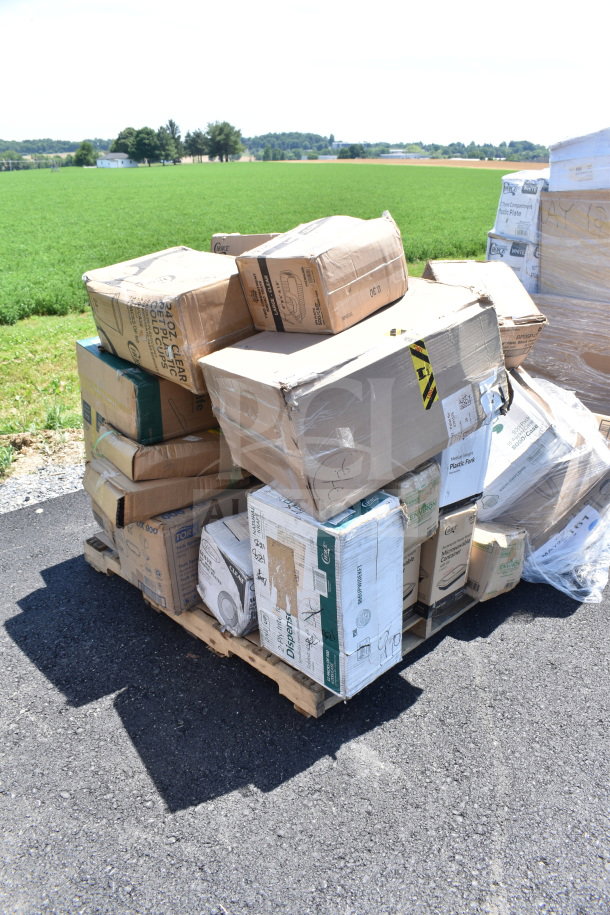 Pallet of 28 assorted scratch and dent boxes including cold cups, sporks, forks, plates. Brand new condition.