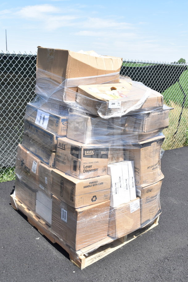 Pallet of assorted scratch and dent items including forks, spoons, and floor mat, in original boxes, shrink-wrapped for auction.