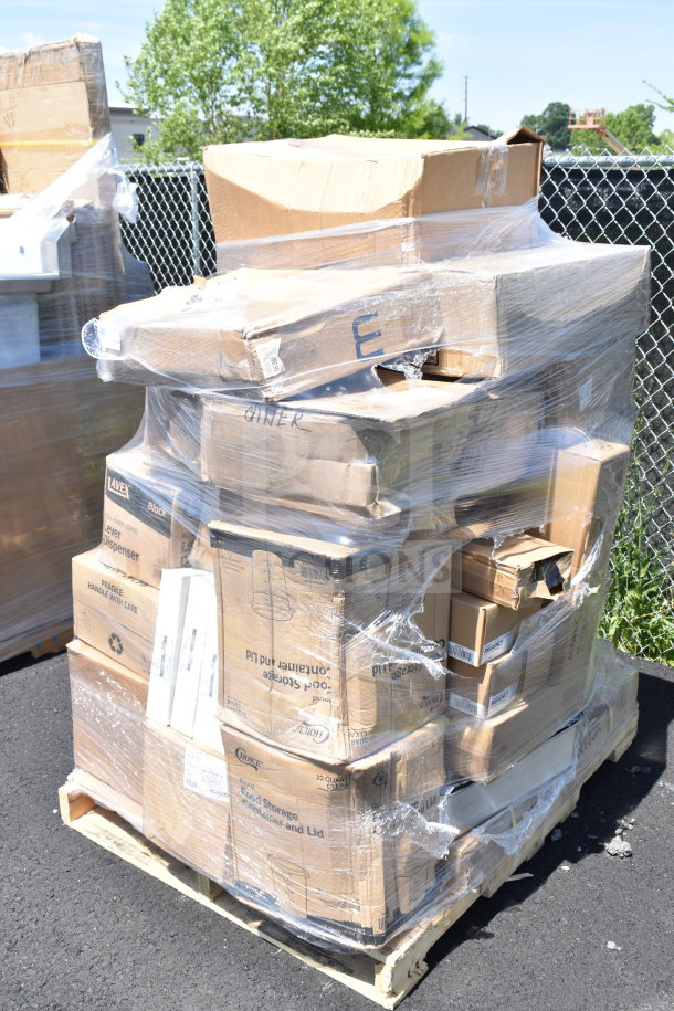 Pallet with 41 boxed items, including forks, spoons, and floor mat, wrapped in clear plastic. Various brand markings visible.