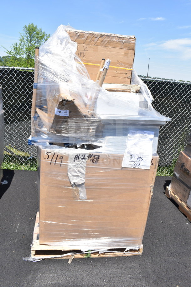 Pallet with 11 new scratch and dent items including chair, dish dolly; wrapped in plastic. Label: "5/19," "286."