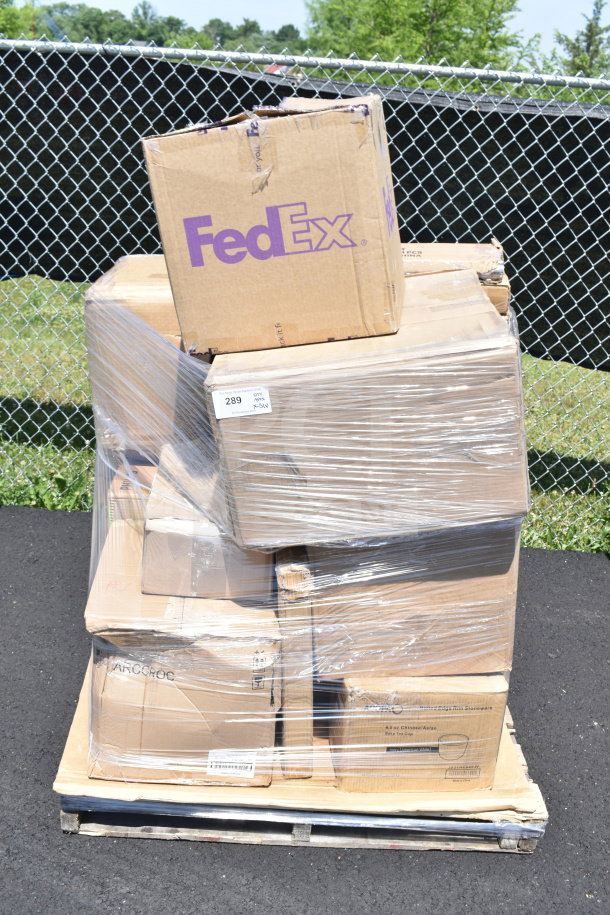 Pallet of shrink-wrapped boxes including tea cups, glasses, milk crates. Boxes marked FedEx and Arcoroc. Scratch and dent condition.
